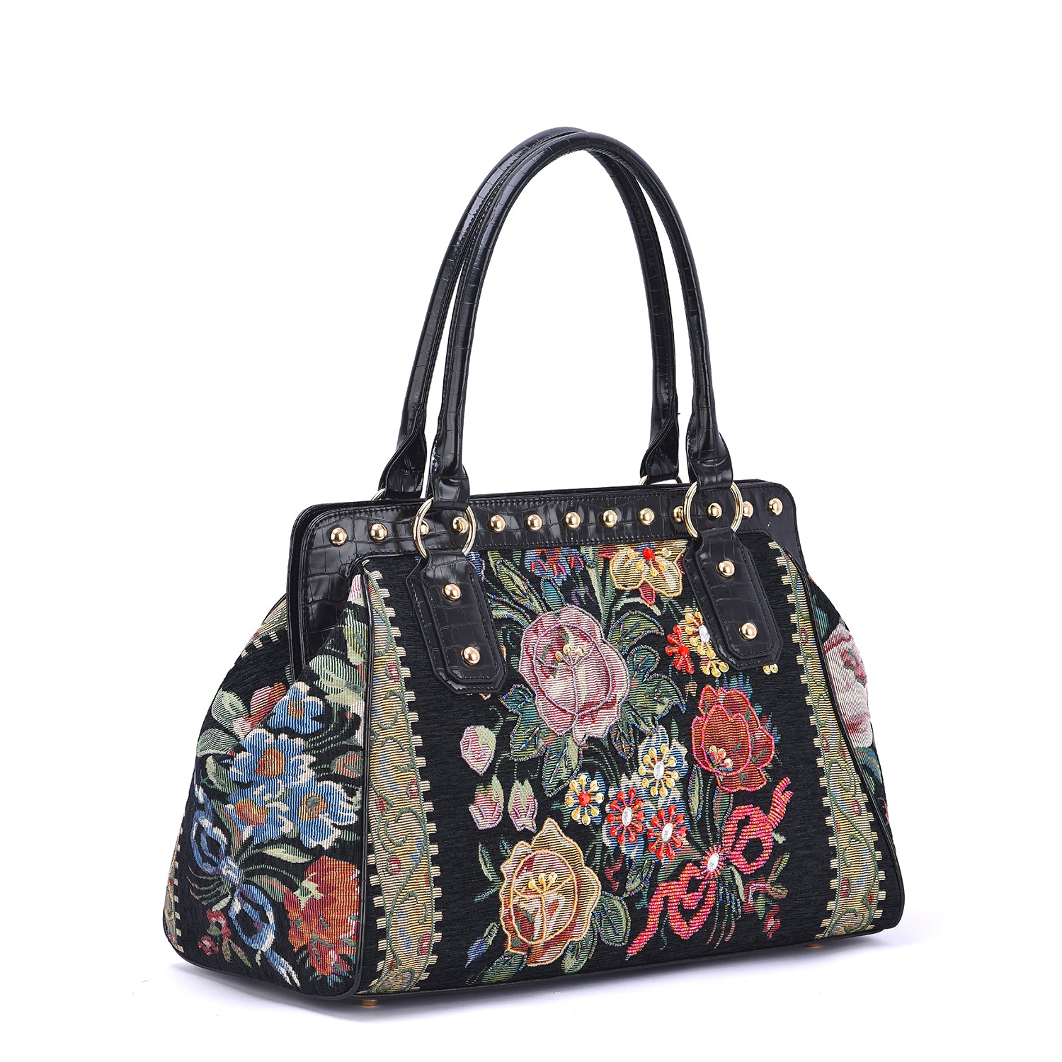 Mellow World black vegan‑leather weekender handbag with colorful embroidered floral tapestry and gold‑tone stud accents, side view