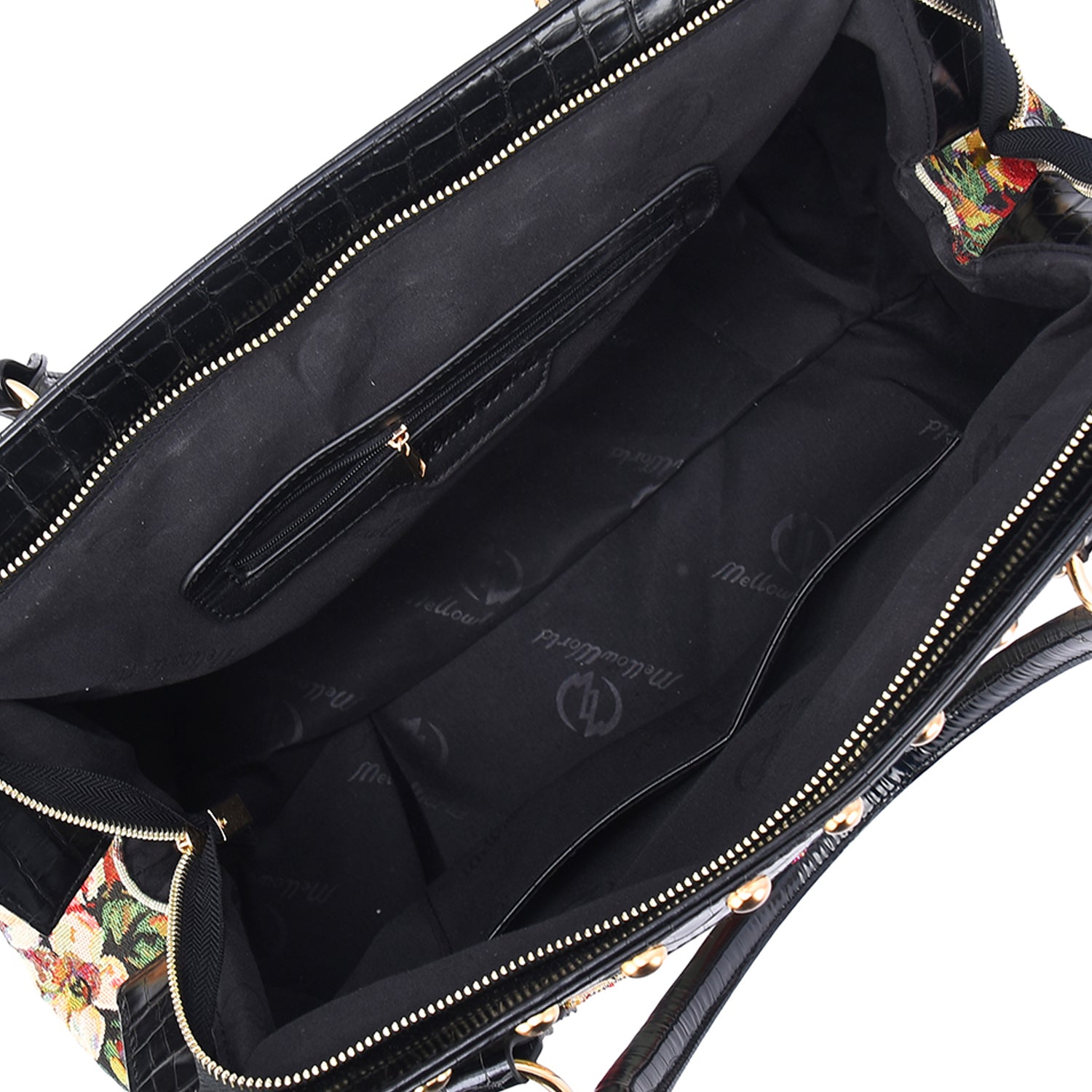Mellow World black vegan‑leather weekender handbag with colorful embroidered floral tapestry and gold‑tone stud accents, inside view