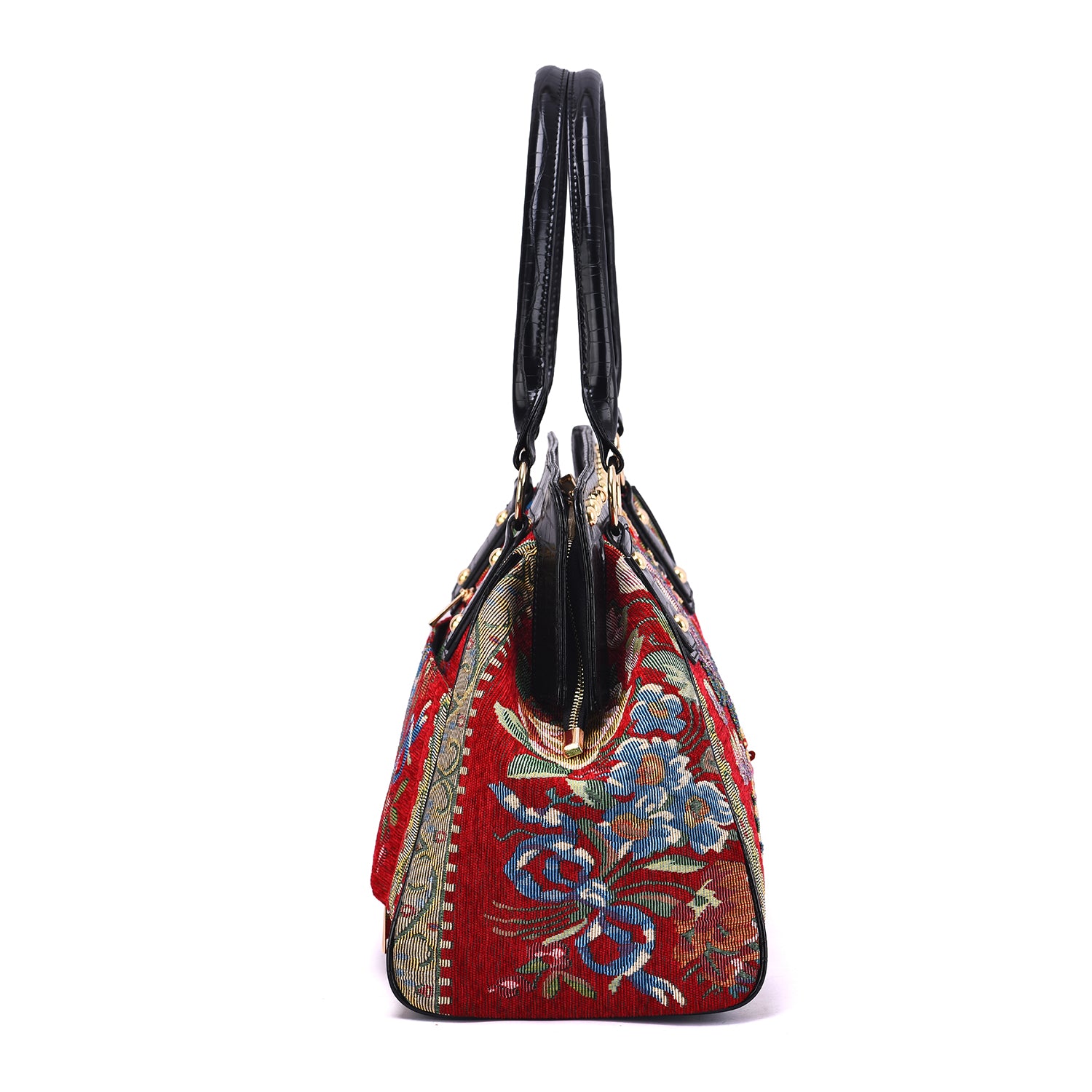 Mellow World red vegan‑leather weekender handbag with colorful embroidered floral tapestry and gold‑tone stud accents, side view